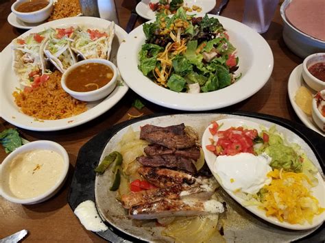 From appetizers to fajitas to desserts and drinks, we use. . Uncle julios north ave photos